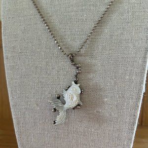 White howlite carved fish and silver backing necklace, 22 inches long